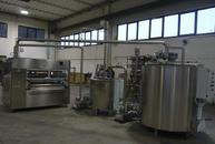 Enrobing machine with 2 tanks melter