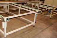 Conveyor with timing belts for profiles in aluminium